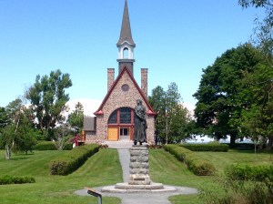 The Evangeline statue and the Church at Grand-Pre.